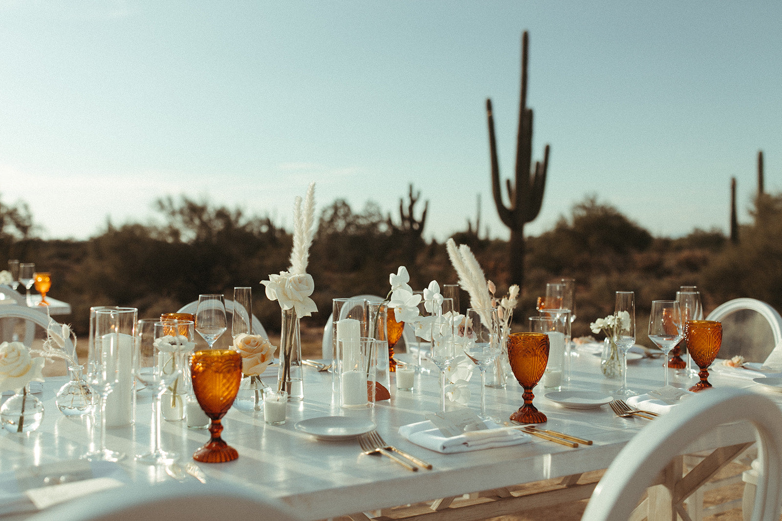 Reception wedding flowers on a table at sunset in Arizona