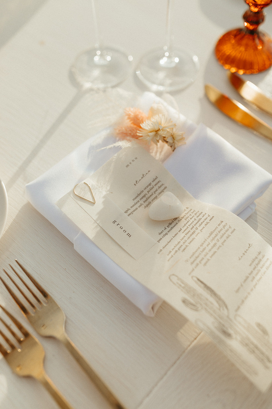Floral details on a reception table at a wedding