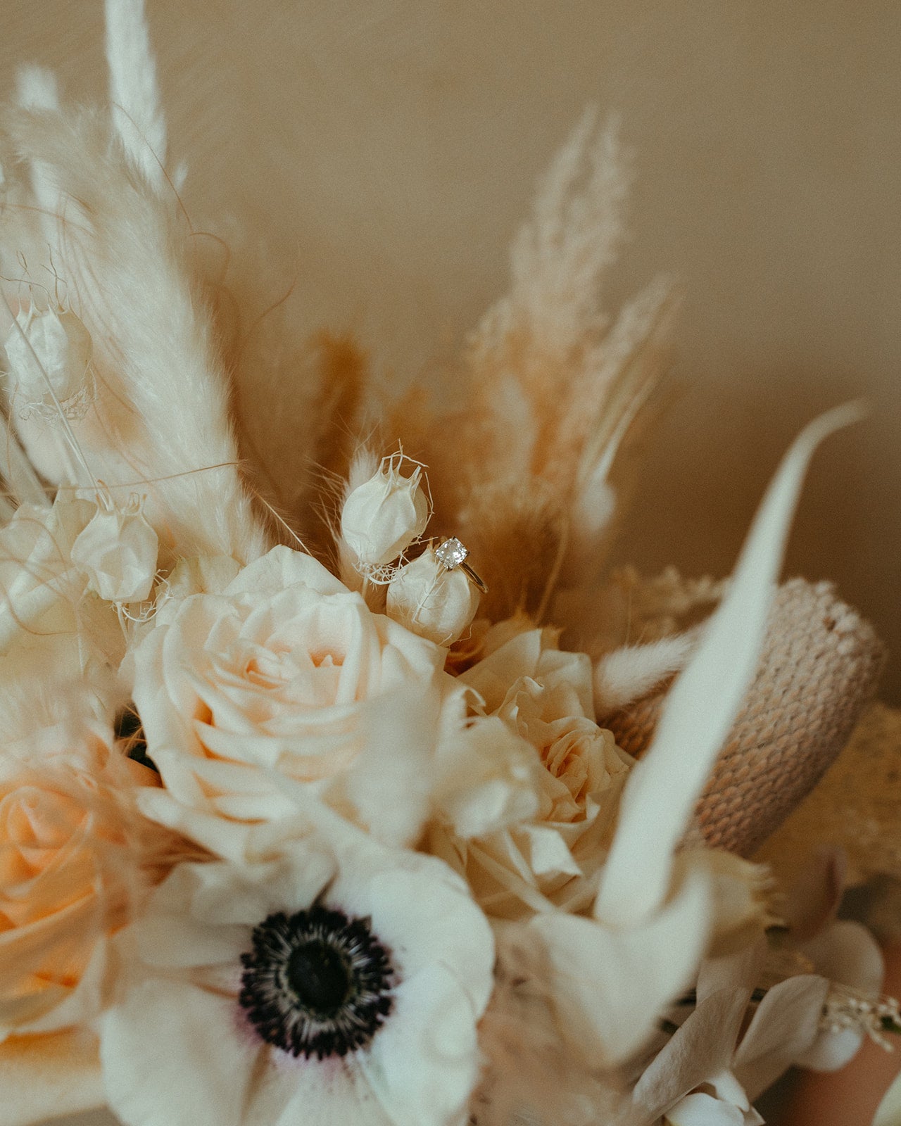 Dried and fresh mixed bridal bouquet with banksia and pampas