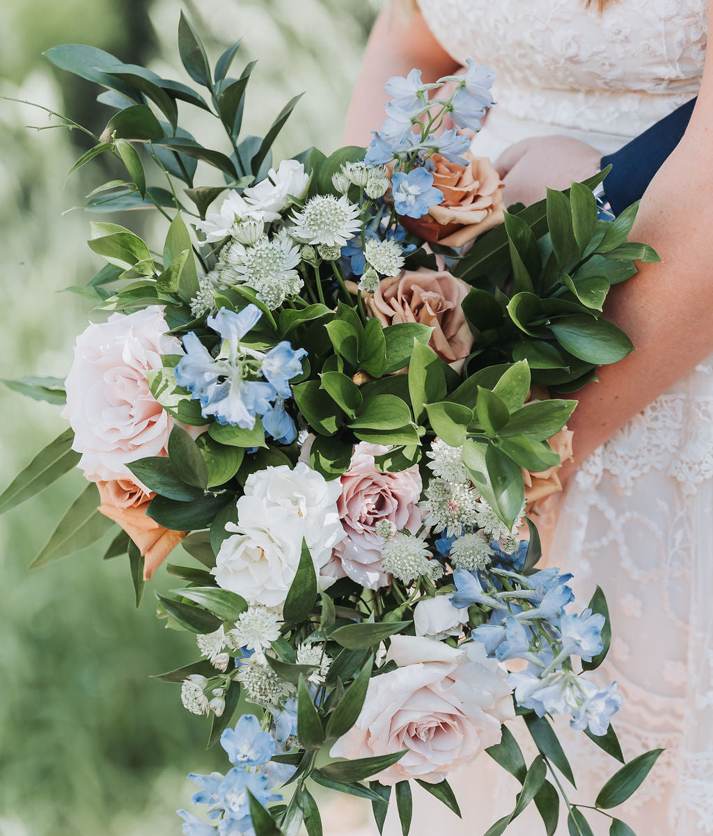 Bridal bouquet with blue and white flowers