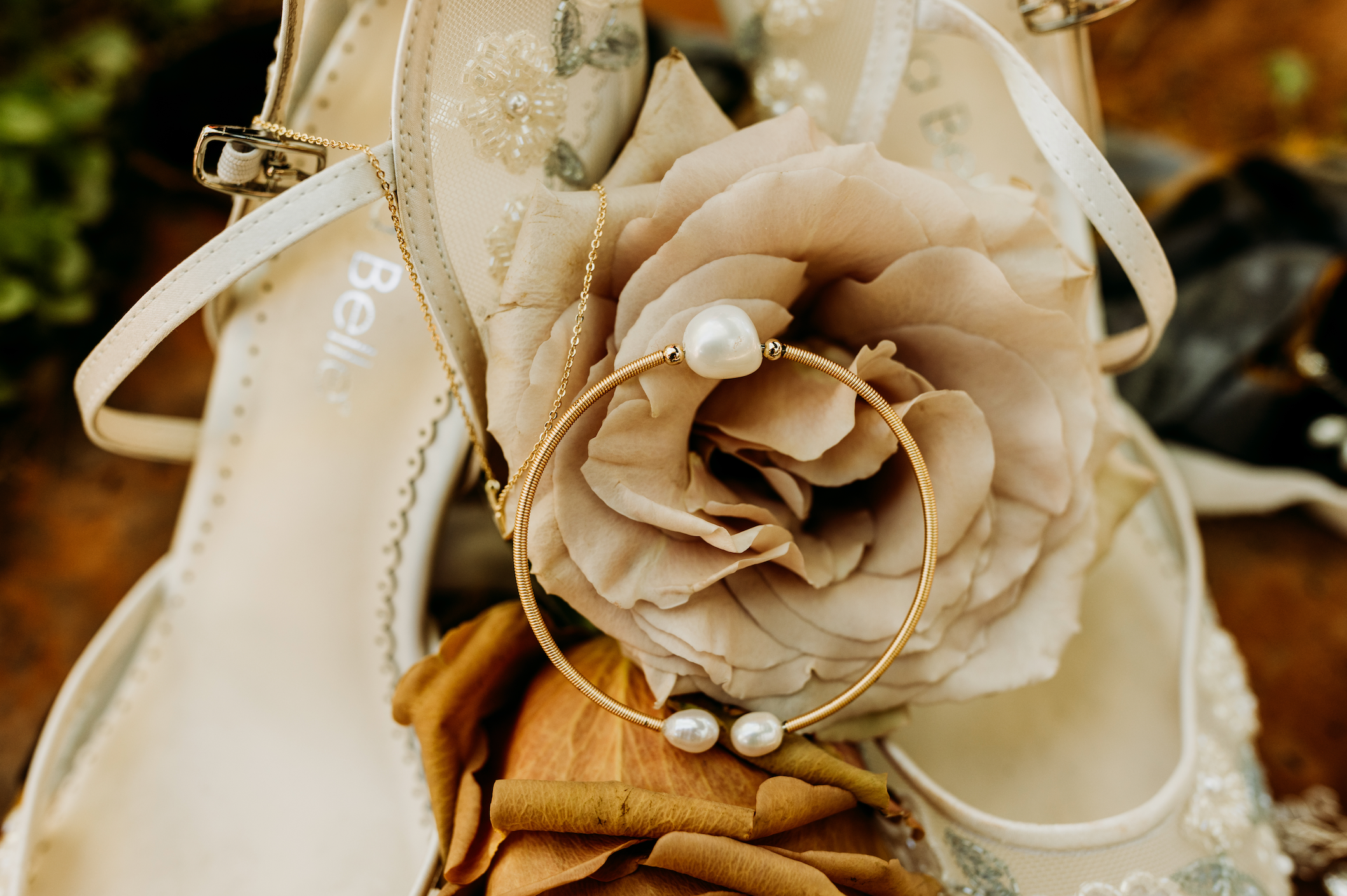 Toffee roses and quicksand roses set up for a wedding detail photo